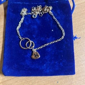 Bracket or anklet letter “H”